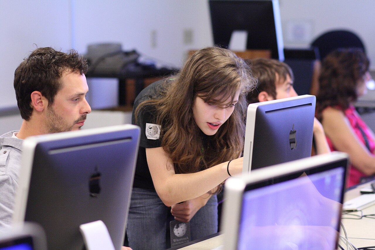 Young people working together in a learning setting
